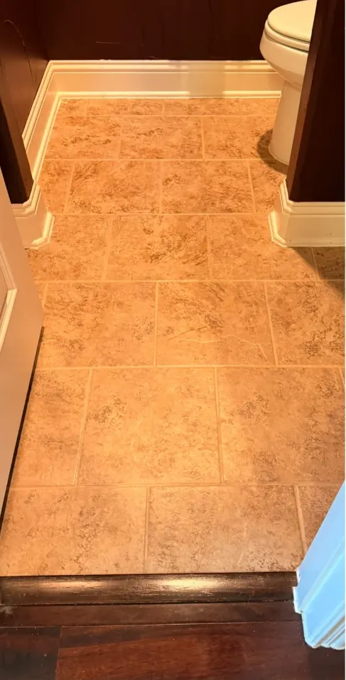 Powder room tile and grout after grout color sealing in DFW