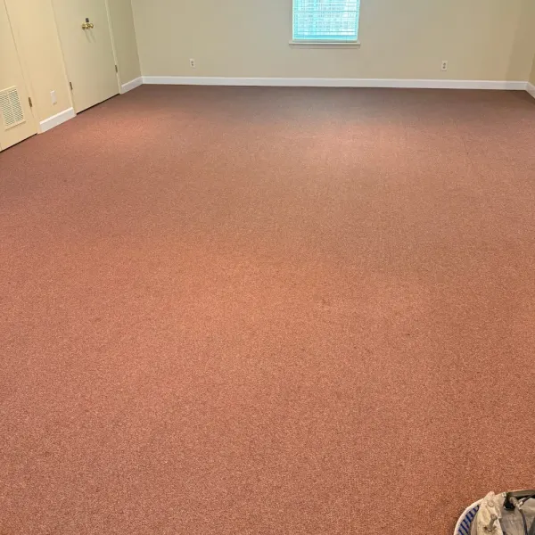 Large carpeted room cleaned with a low-moisture carpet machine