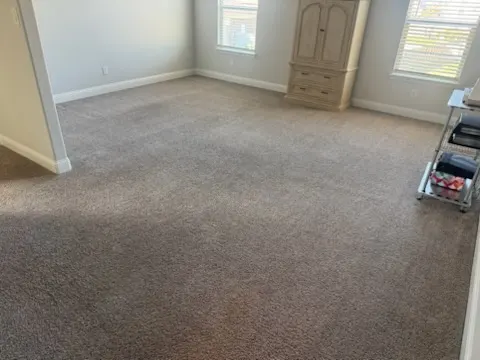 Large bedroom carpet after cleaning in a Lantana home