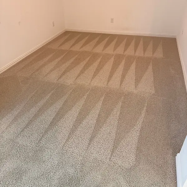 Empty room with freshly cleaned carpet before move-in in Roanoke