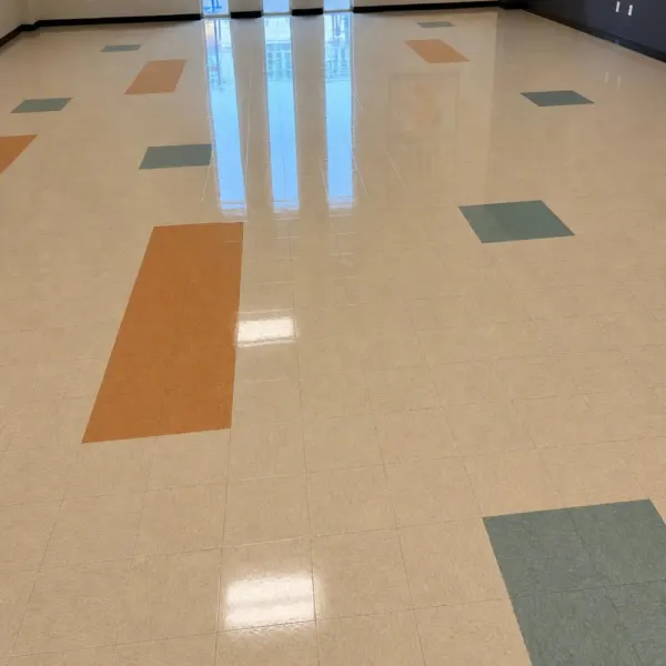 Glossy VCT floor after strip and wax