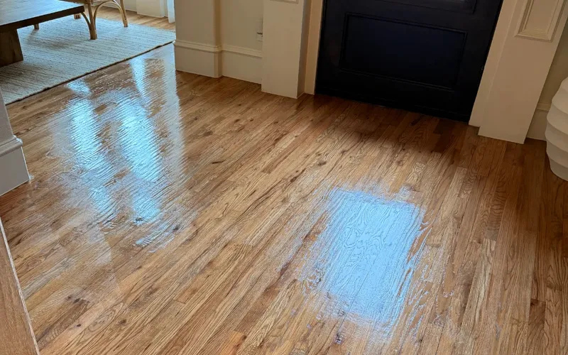Glossy oak hardwood entryway after cleaning and buffing