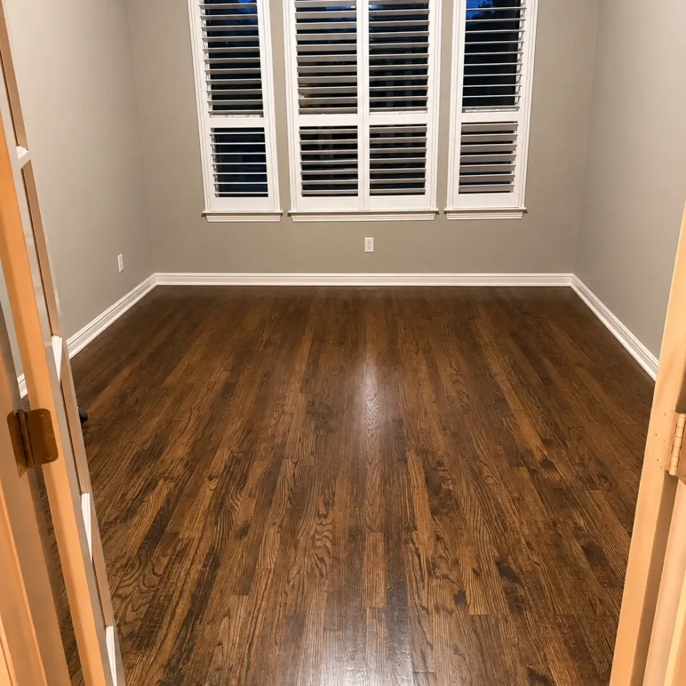 Hardwood floor seen through French doors after cleaning
