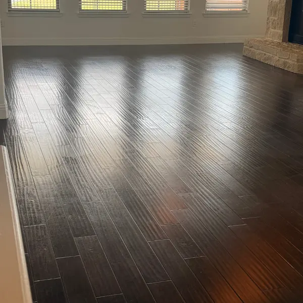 Living room hardwood after cleaning in a Glade Crossing home in Grapevine