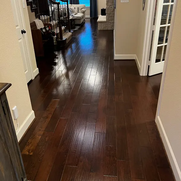 Entry hallway hardwood after cleaning before weekend guests in Lantana