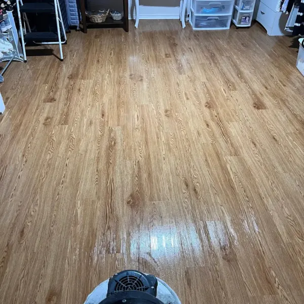Luxury vinyl plank floor with a fresh shine after cleaning