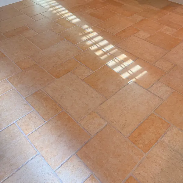 Travertine floor after natural stone cleaning in a Keller home