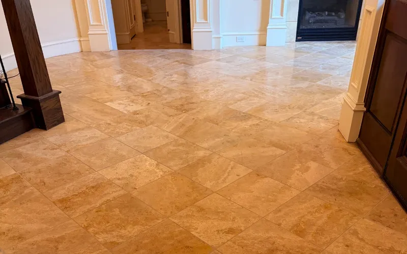 Polished travertine foyer floor after natural stone cleaning