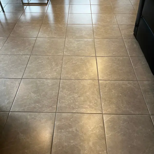 Kitchen tile floor after tile and grout cleaning in a Justin home