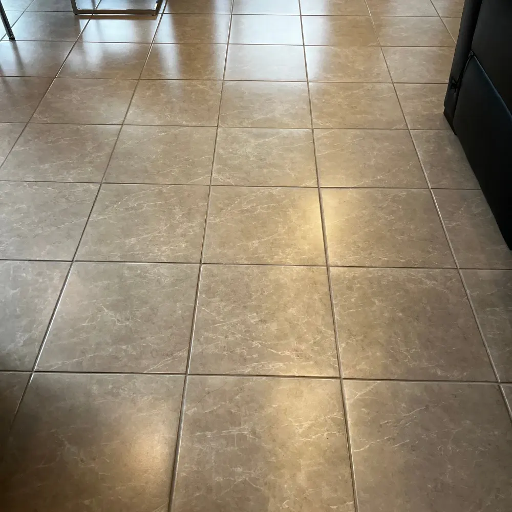Clean marble-look tile floor after tile and grout cleaning