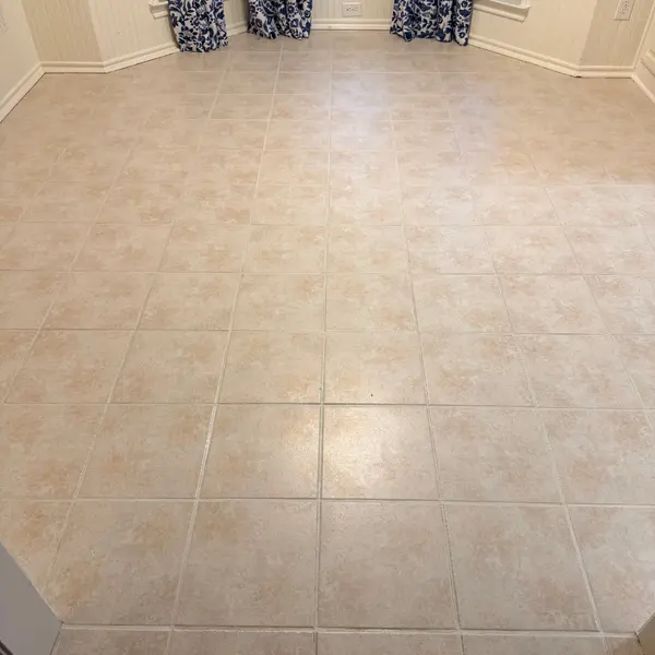 Dining area tile floor after tile and grout cleaning in Northlake