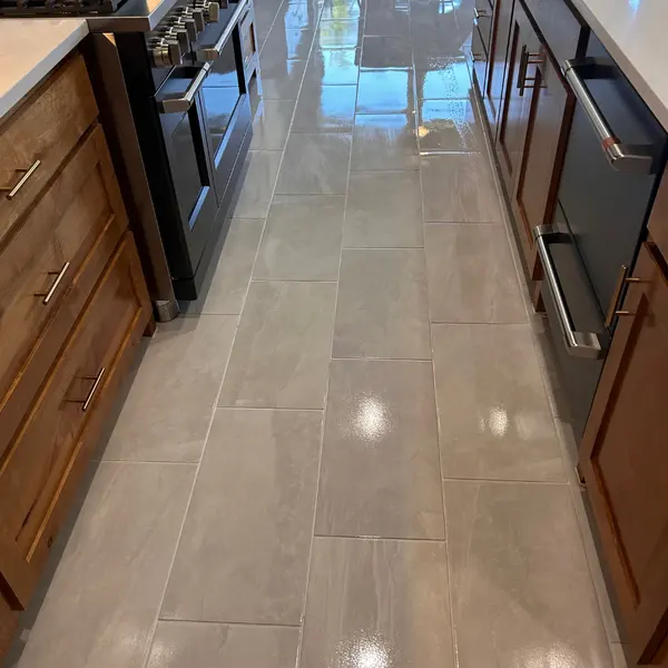 Kitchen tile floor after tile and grout cleaning in a Carillon home in Southlake