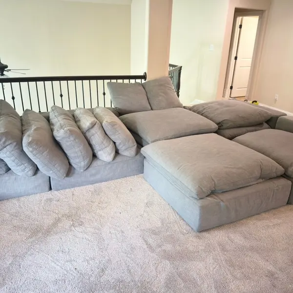 Sectional with cushions set out during upholstery cleaning in a Lakes of Argyle home