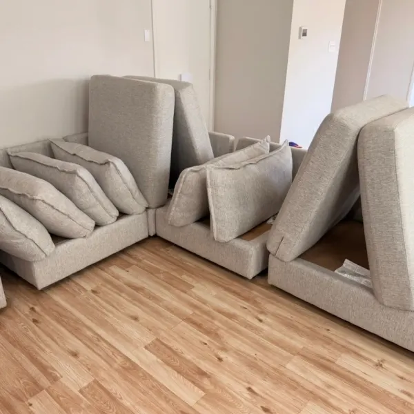 Gray sectional cushions drying after cleaning