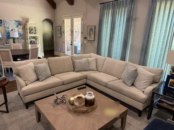 Cream L-shaped sectional after upholstery cleaning in a home near Grapevine, TX